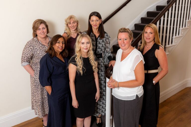 Tia Bickley (front centre) with the Family team