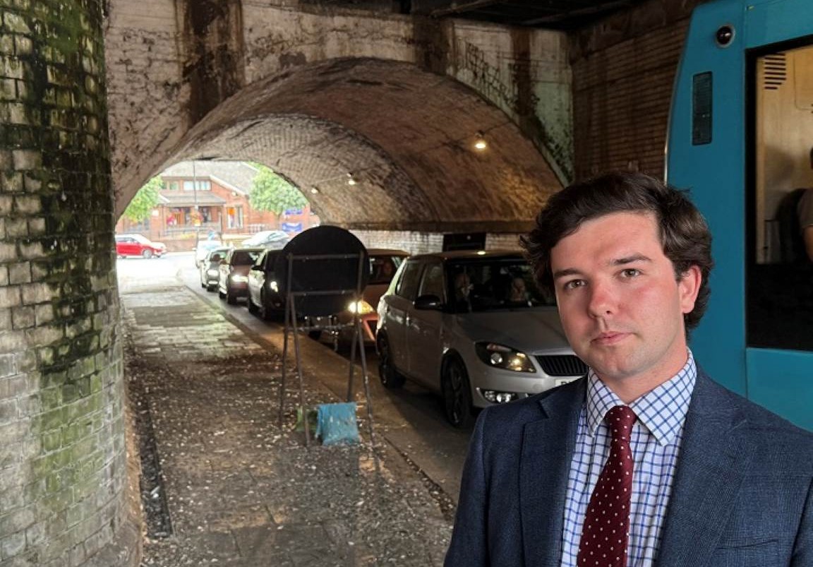 Councillor Alex Wagner on Cross Street under the railway bridge. Photo: Shropshire Council