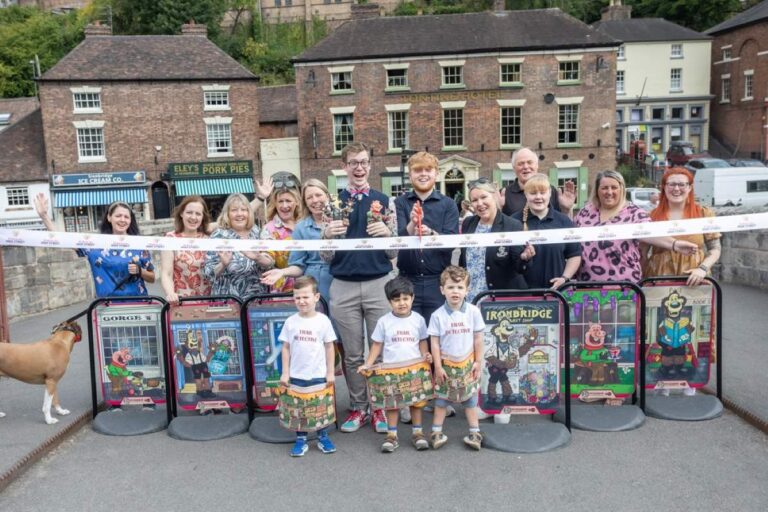 Councillor Ollie Vickers and Leo Wright, centre, officially launch the new trail in Ironbridge. Photo: Telford & Wrekin Council