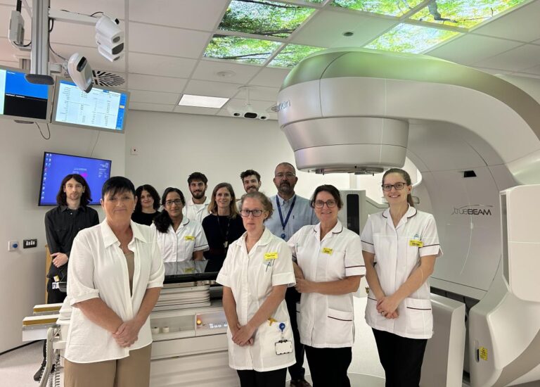 First patient Helen Soanes with Radiographers Janice Reid (left) and George Glennon (right)
