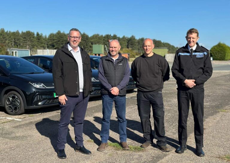 PCC John Campion, Dave Newbold West Mercia Police's Transport and Fleet Manager, Aaron Keay West Mercia Police's Workshop Supervisor, and Chief Constable Richard Cooper 