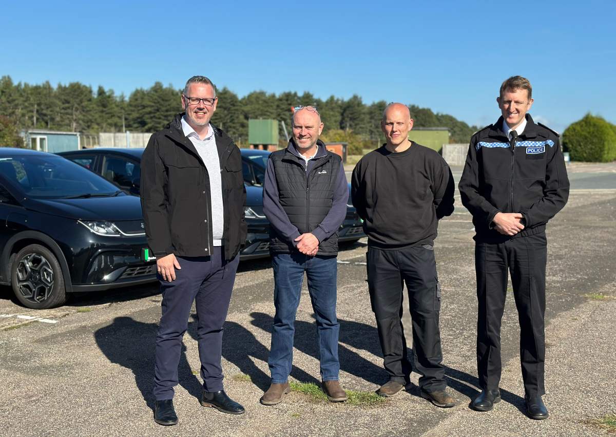 PCC John Campion, Dave Newbold West Mercia Police's Transport and Fleet Manager, Aaron Keay West Mercia Police's Workshop Supervisor, and Chief Constable Richard Cooper