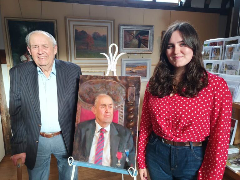 Milner Whiteman OBE at the unveiling of his portrait with his granddaughter, Much Wenlock Town Council's youngest elected member Cllr Daisy Whiteman