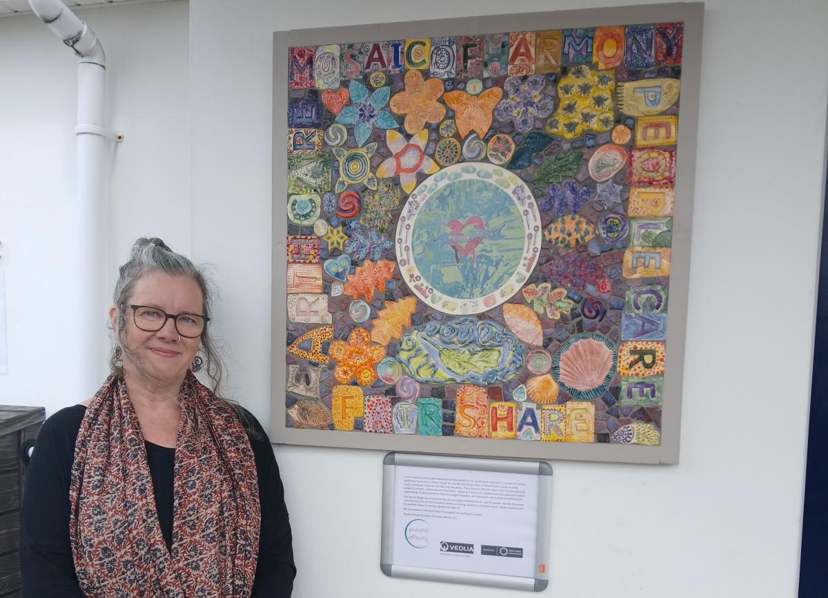 Project Leader Rosalyn Donati with the piece made by members of the Autism Hub