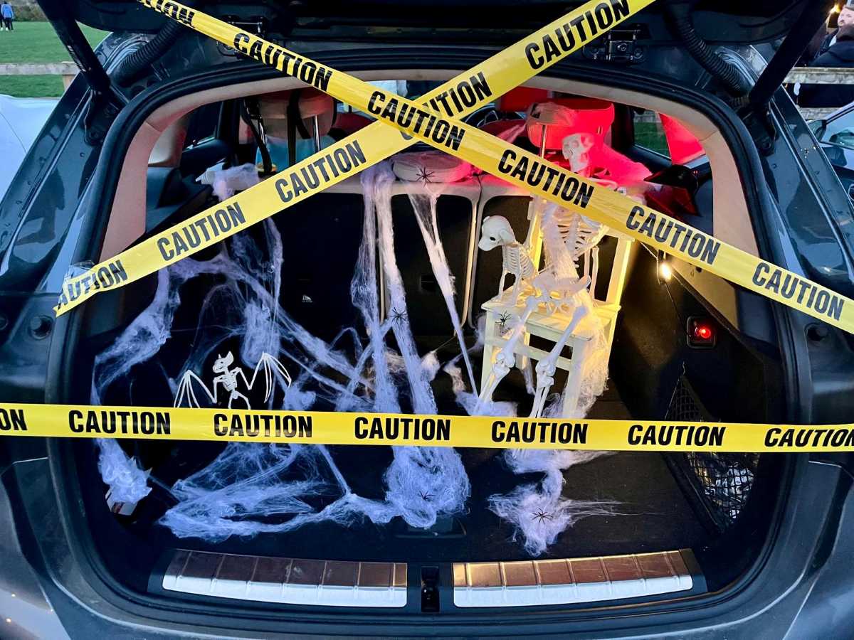 Parent volunteers go all out, decorating their cars and handing out sweets