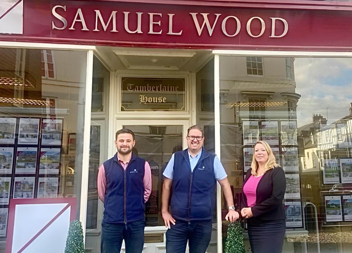 Andrew Cadwallader, Director of Samuel Wood, centre, is pictured with Jack Davies and Lynnette Woodfield from the Ludlow team