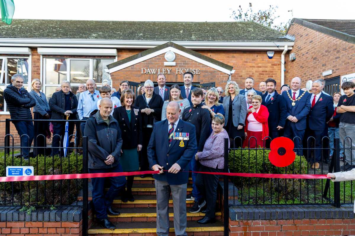 Cutting the ribbon to officially open the Christopher Turley Armed Forces Community Hub. Photo: Telford & Wrekin Council