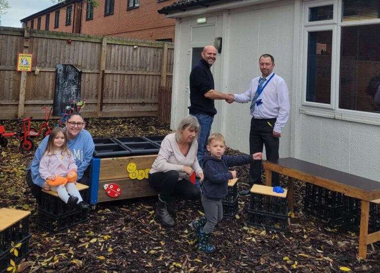 Mike Coope from RSJ and Alan Watkins of Silver Threads Hall with some of the centre users
