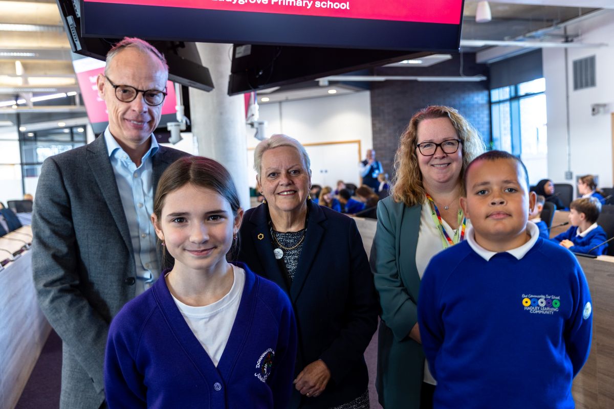 Local schoolchildren with left to right: Simon Wellman, Director of Education and Skills at Telford & Wrekin Council, Councillor Shirley Reynolds and Sally Sixsmith, Headteacher at St George's Primary School. Photo: Telford & Wrekin Council