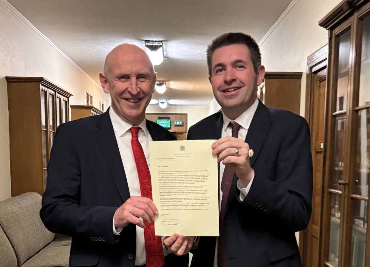Shaun Davies MP collecting the letters from the Secretary of State for Defence, the Rt Hon John Healey MP