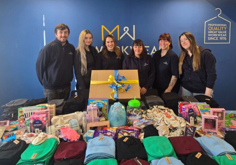 Members of the MyWorkwear team pictured with their Christmas Smile Project donations