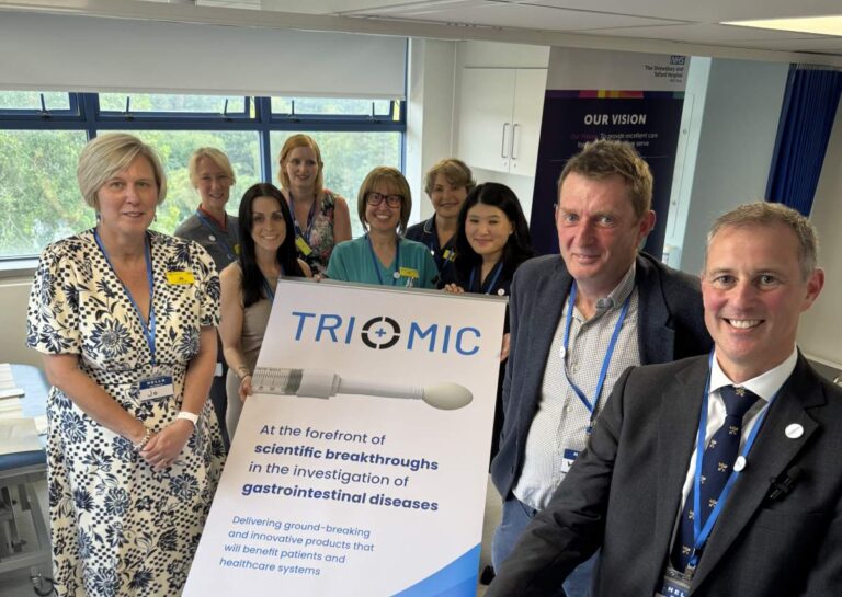 At the opening of the clinic rooms earlier this year: Jo Williams, Group Chief Executive of SaTH, Hugo Lywood, Chief Executive of Origin Sciences, and Jon Lacy-Colson. Back other members of the research team