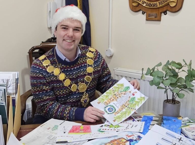 The Mayor of Shrewsbury with Christmas card competition entries