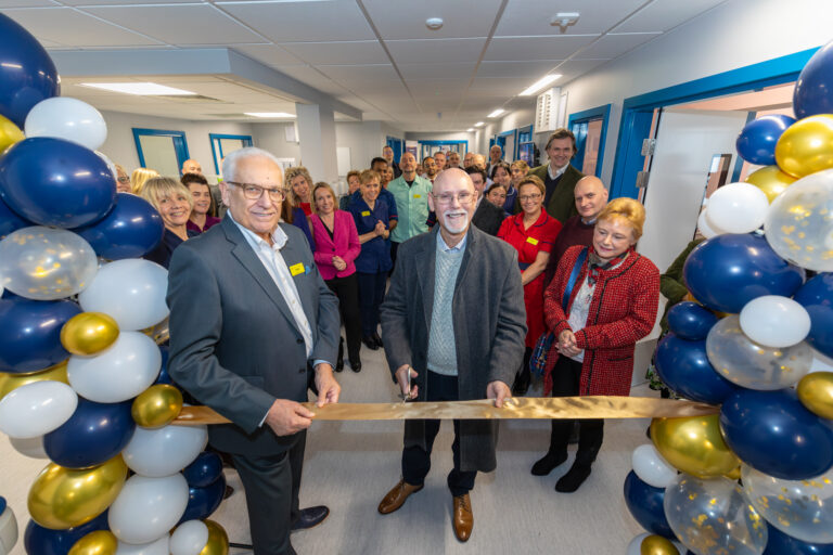 Vice Chair Trevor Purt and former patient Nick Taylor cutting the ribbon