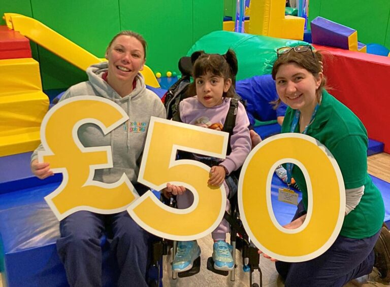 Hareem helps hospice staff launch the £50 Challenge at Hope House