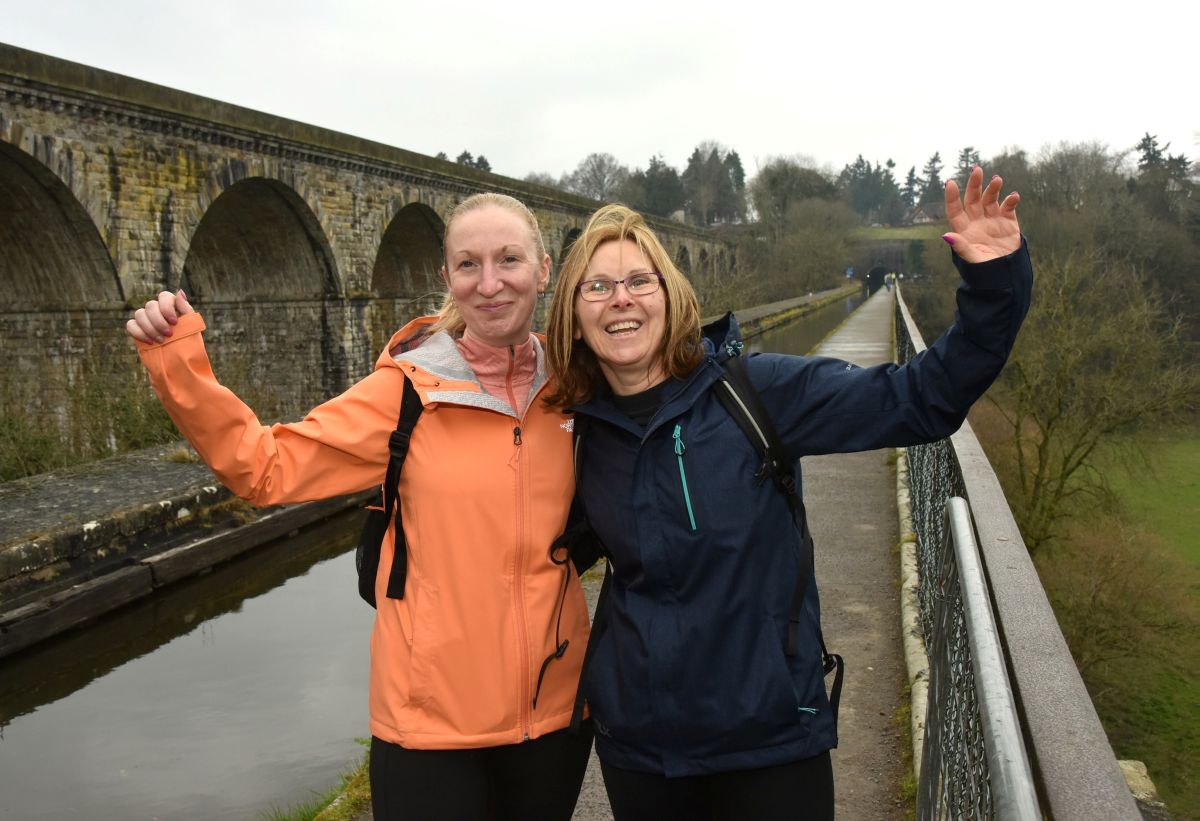 Walkers head over the world-famous and majestic Pontcysyllte Aqueduct